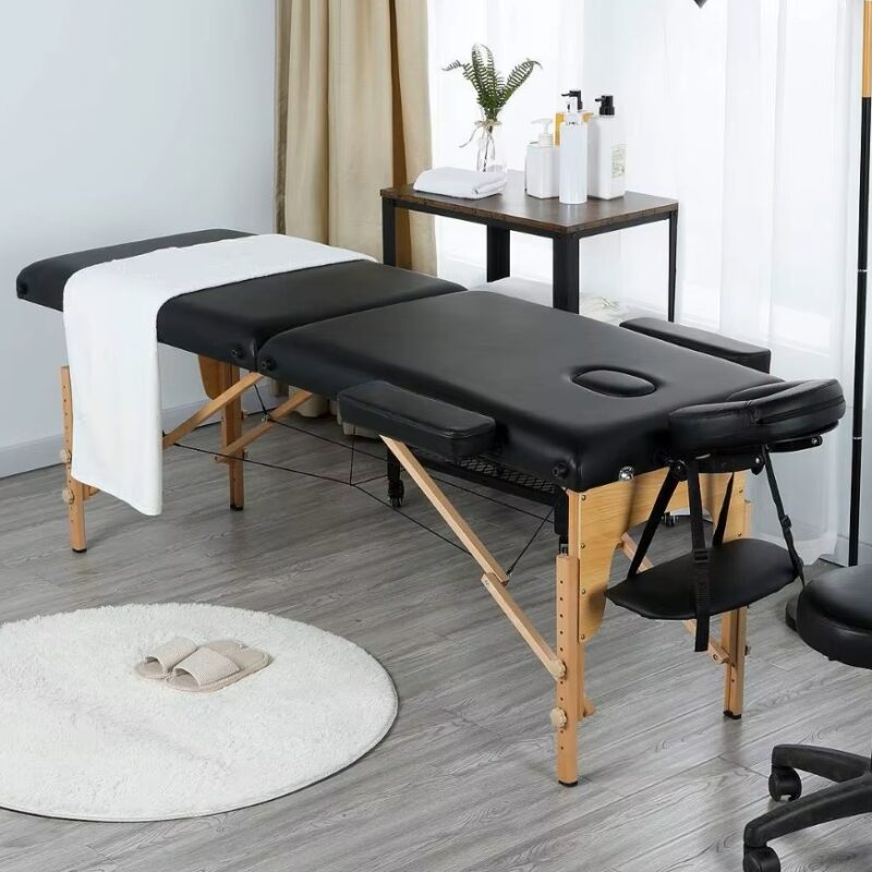 Masa de masaj pliabila, 2 zone, cadru lemn, spuma 5cm, inaltime 55-76cm, piele ecologica, dimensiuni 60x213cm, culoare Neagra